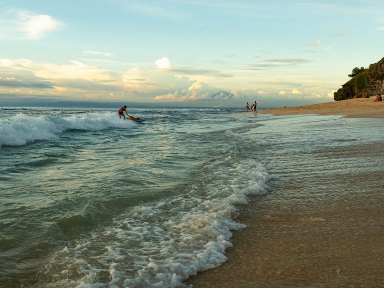 Bali-dreamland-beach-dog-on-surfboard